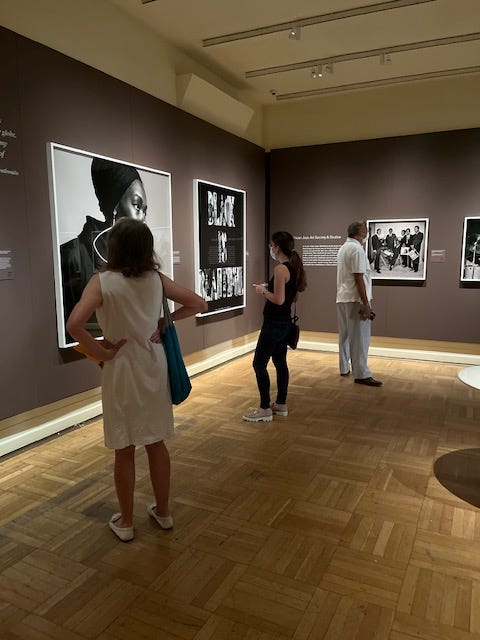 Exhibit-goers view Brathwaite photographs at the opening of the New York Historical Society show.