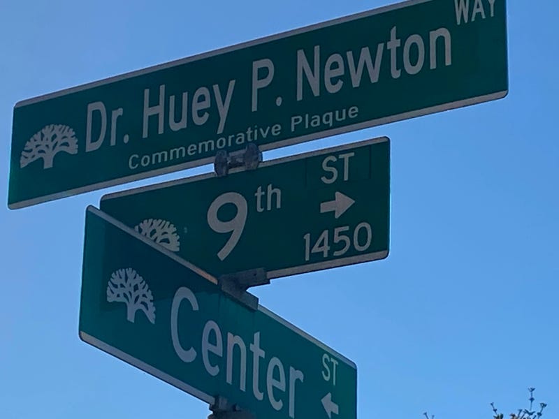Dr. Huey P. Newton was honored Wednesday with the renaming of the Oakland street where he was gunned down in August 1989.