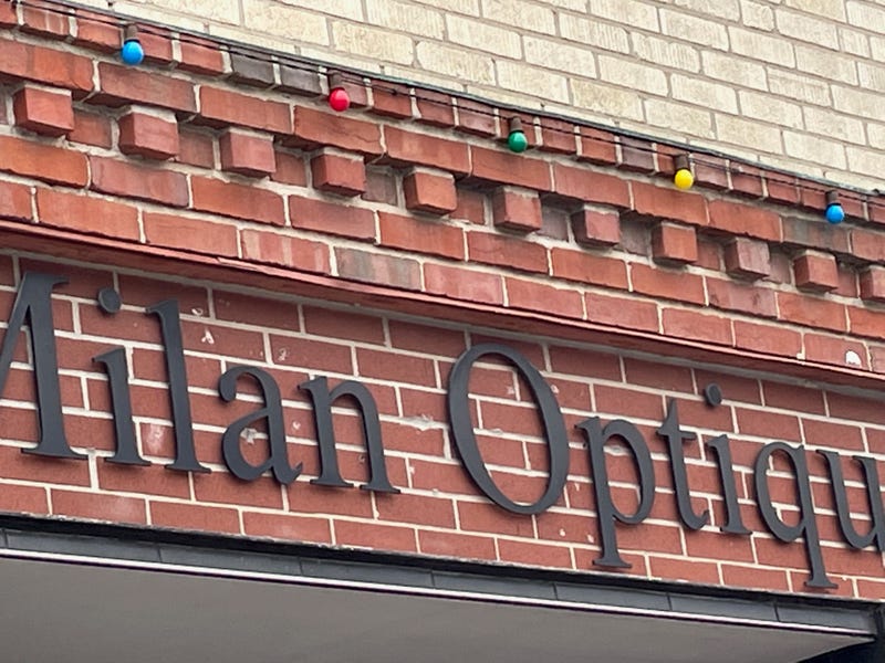 Lightbulbs strung along a building facade at the Country Club Plaza in Kansas City