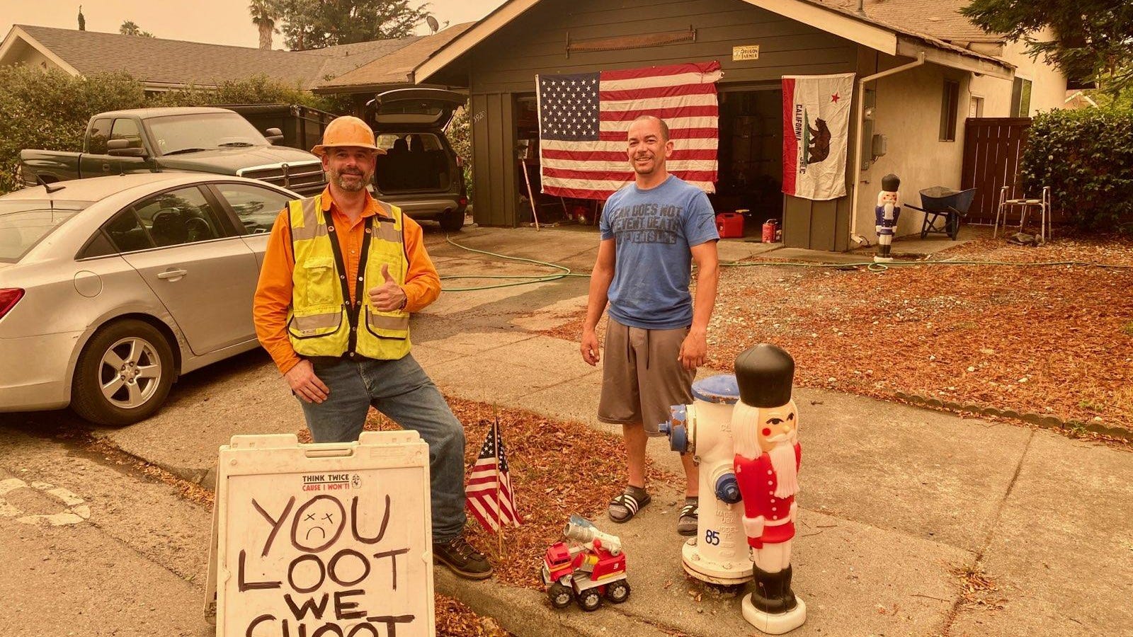 'You loot we shoot': Neighbors defy wildfire evacuation orders to protect property