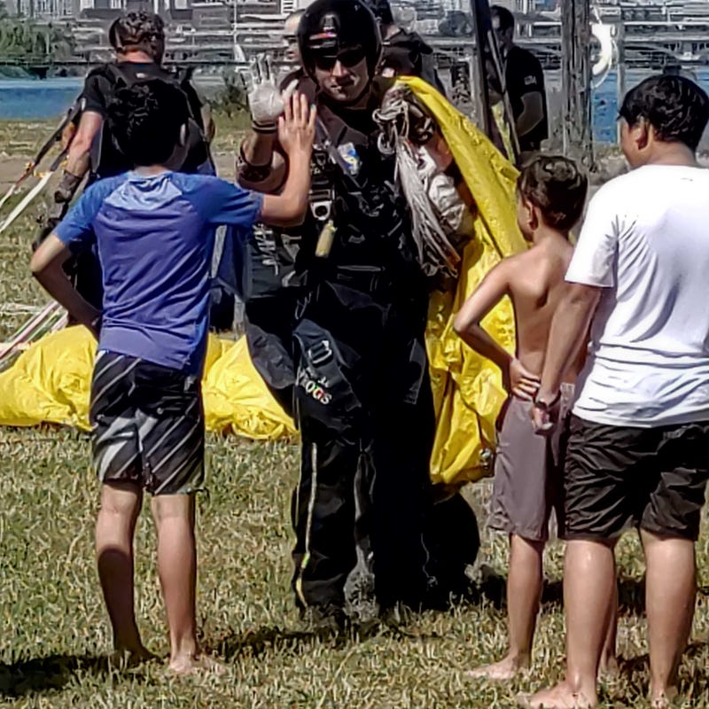 The U.S. Navy put their elite parachute team on display with an late morning jump over the Detroit River on Thursday to celebrate Detroit Navy Week.
