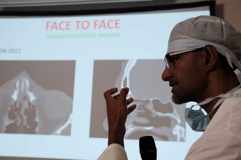 doctor explaining injuries