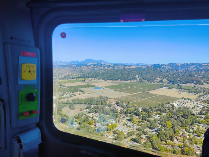 Sonoma County's first firefighting helicopter flies above old Tubbs Fire scars on October 5, 2022.