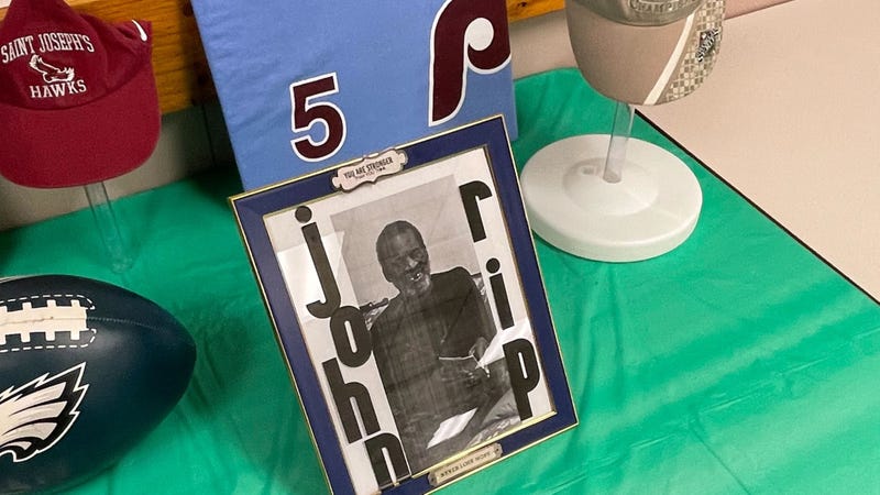 A display table at a celebration of life for John Sutton.