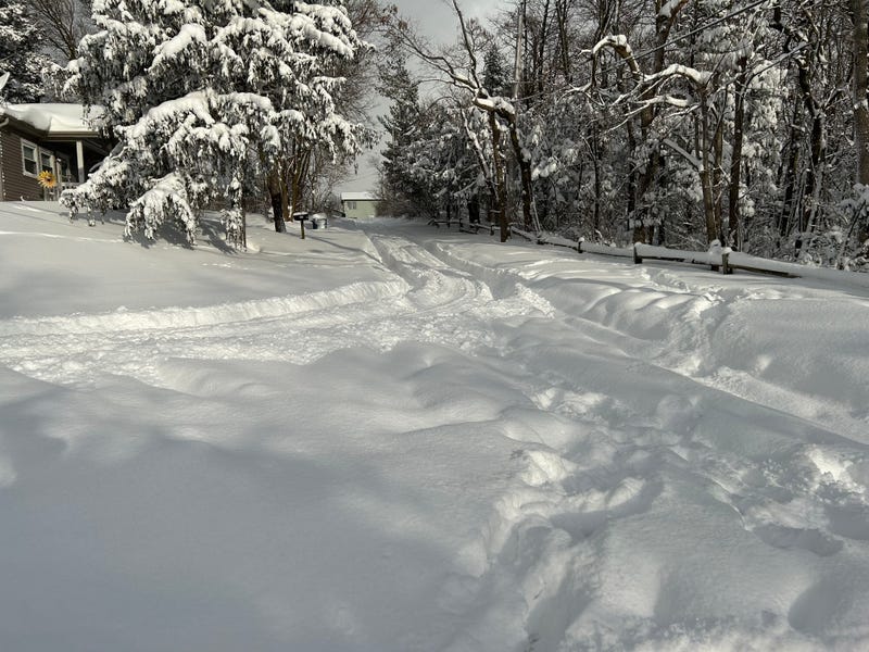 It was difficult to tell where the road is in Michigan City, Ind., on Saturday, after nearly 3 feet of snow fell in the area.