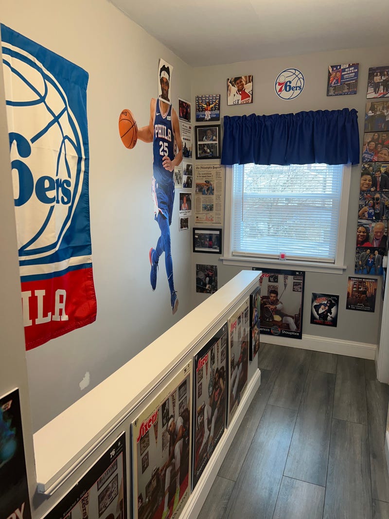 Inside Lauren Gordon's home, where she has a large amount of Philadelphia 76ers tributes on her walls.