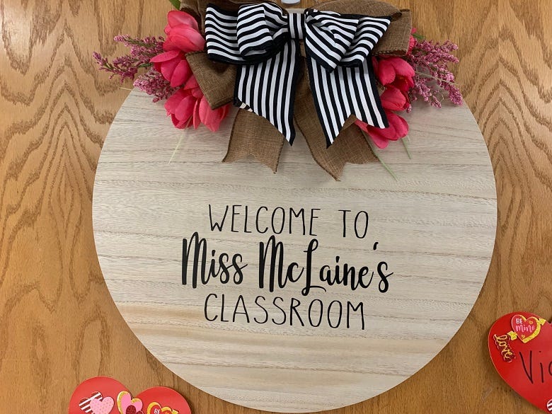"Miss McLaine" sign on her door