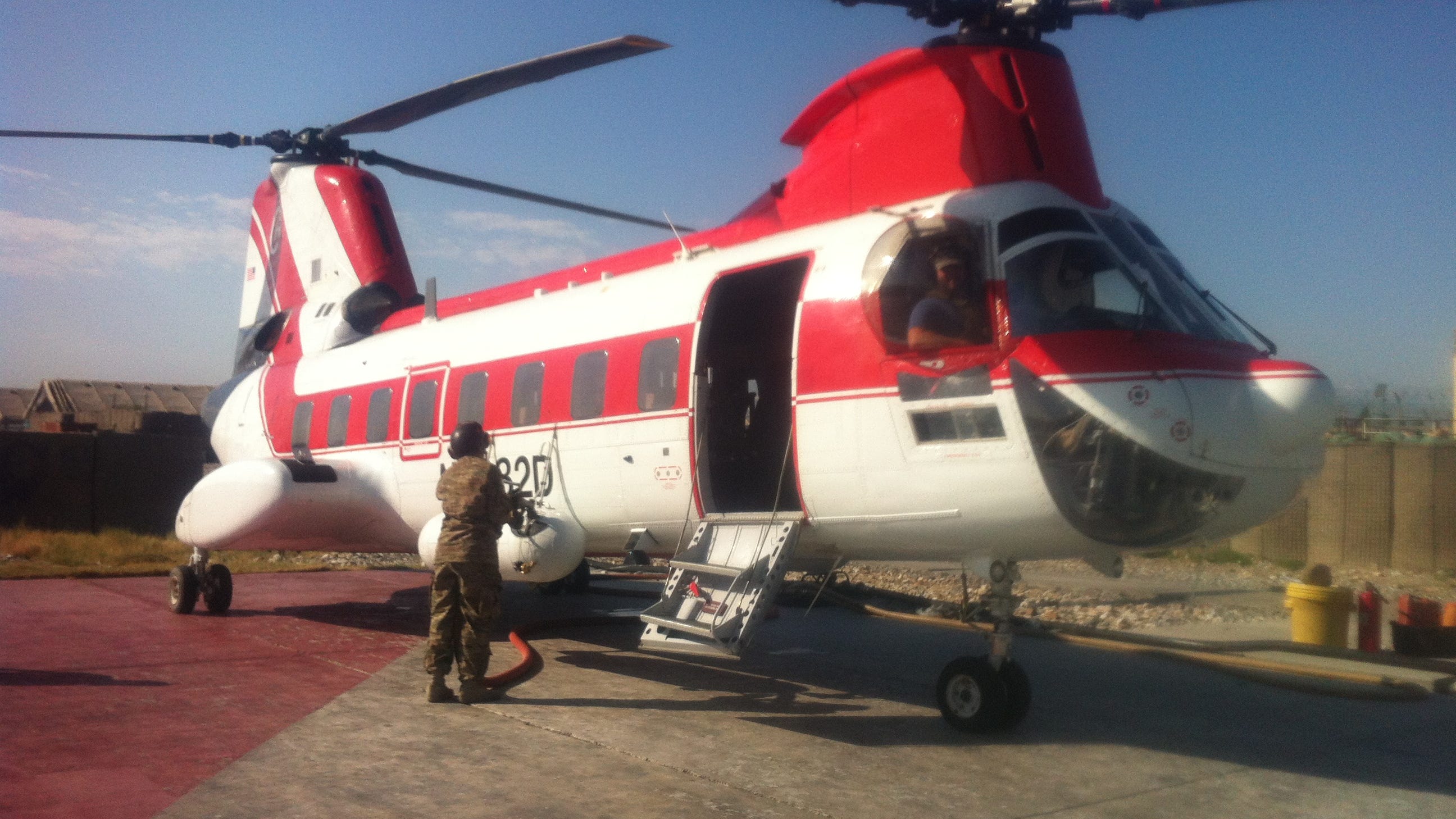 The red and white Helicopters in Afghanistan, contractors fly the friendly skies