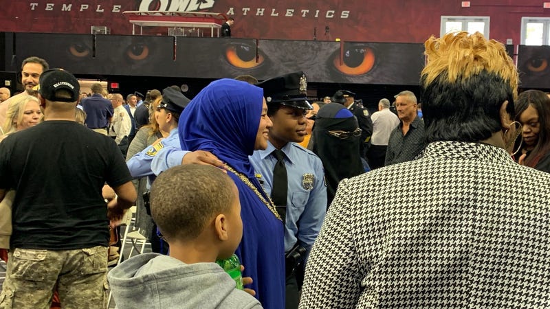 Kareema Blocker, in uniform, after graduating from the Police Academy.