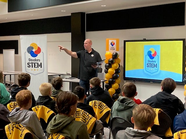 Chris Hoke speaking to students at David E. Williams Middle School