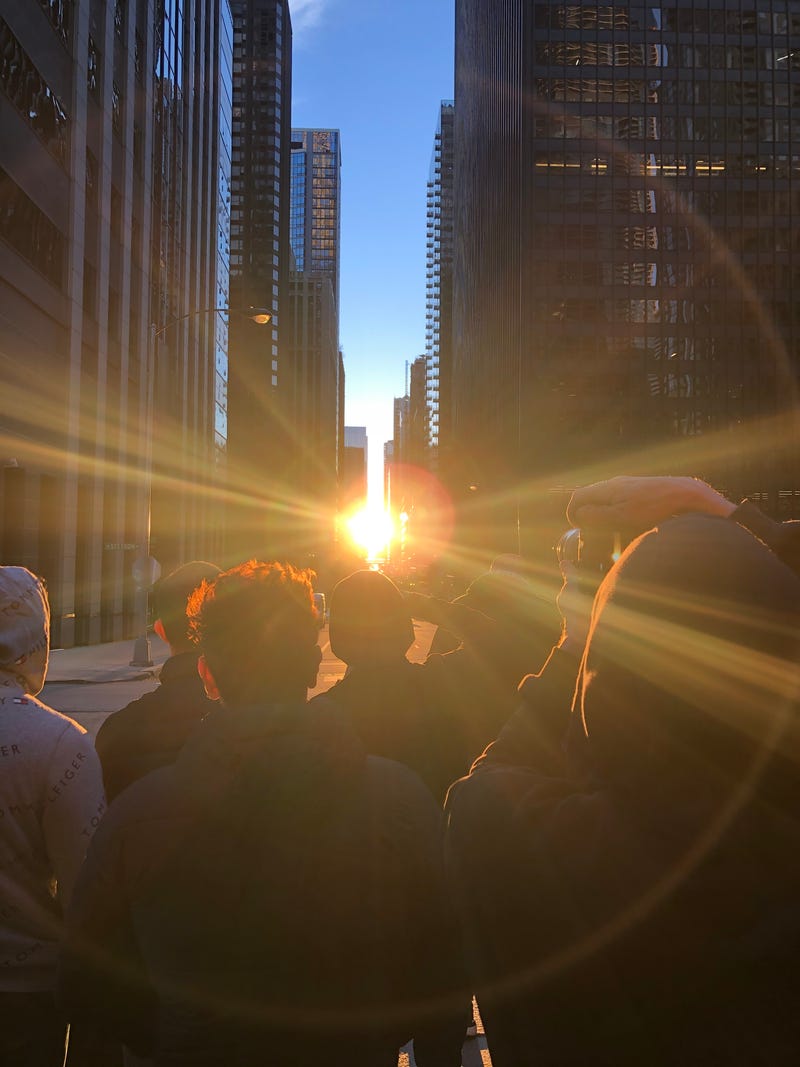 Photographers - professionals and amateurs - were seen all over downtown between 6 p.m. and 7 p.m. on Saturday to try and get the perfect shot of a rare phenomenon - the dramatic alignment of the setting sun and Chicago's "L" trains and skyscrapers.