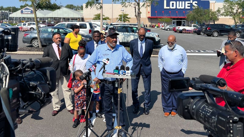 Delaware NAACP officials and the family of Tremaine Jackson speak to the media in front of the Lowe's near where Jackson was shot by Delaware state troopers.