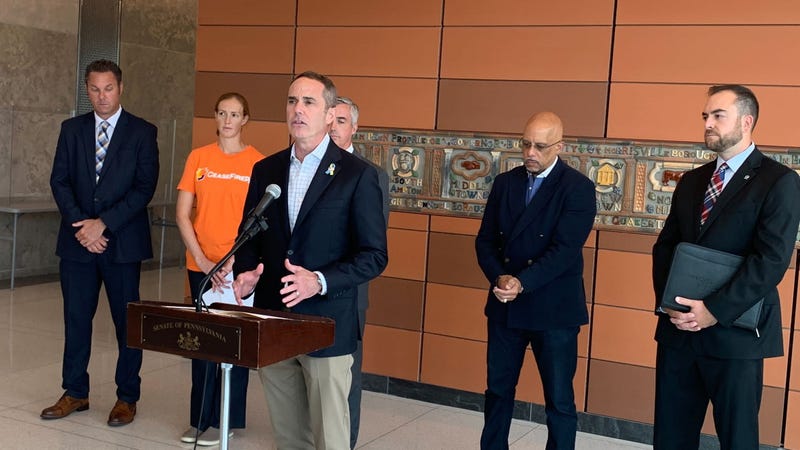 State Sen. Steve Santarsiero, D-Doylestown (at the podium), Bucks County Deputy District Attorney Dave Keightly, Jr. (right).