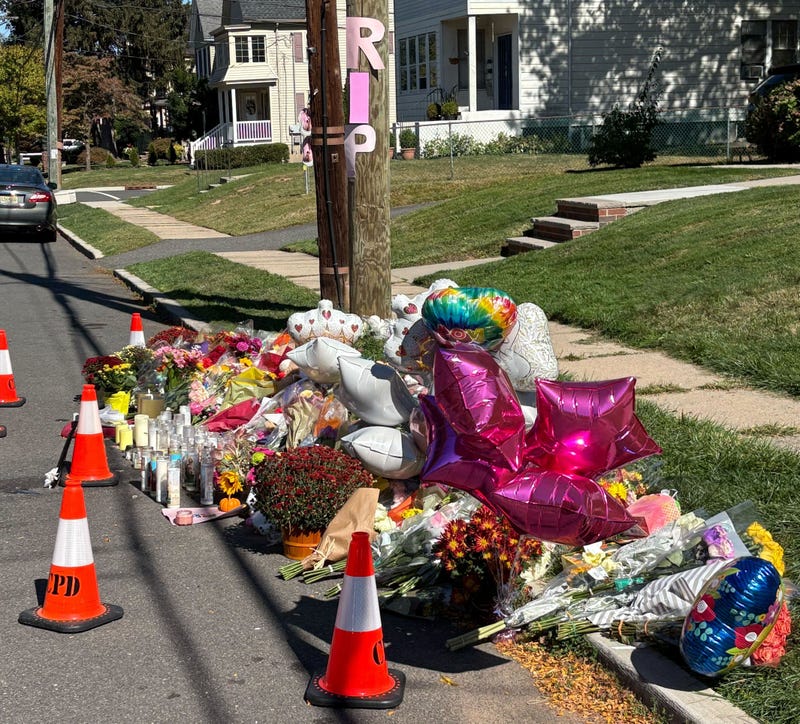 A memorial to the two girls was growing Wednesday on Burnside Avenue, with friends, family and total strangers stopping by to pray and place flowers
