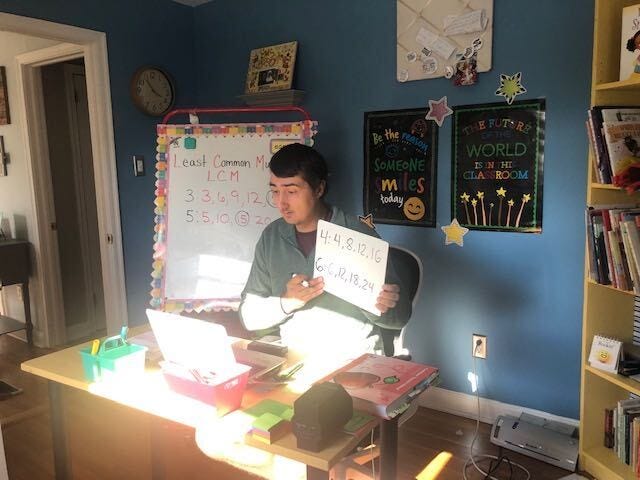 Strawberry Mansion High School teacher Jaimason Miller works remotely.