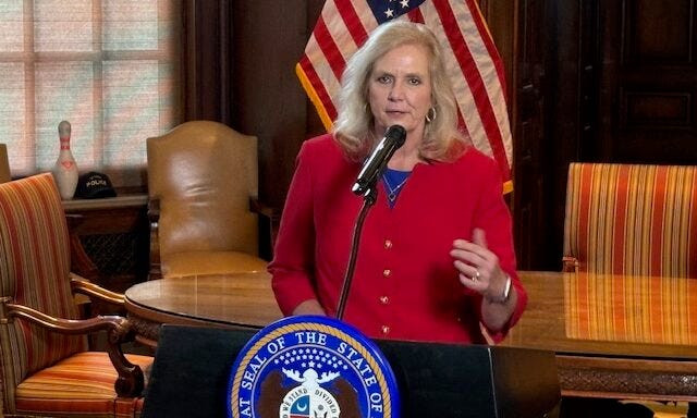 Catherine Hanaway talks to reporters on Aug. 19 after being announced as the state’s next attorney general.