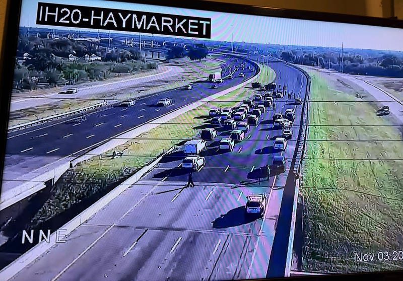 A woman is dead after an hours-long standoff that shut down both directions of Interstate 20 southeast of Dallas on Monday.