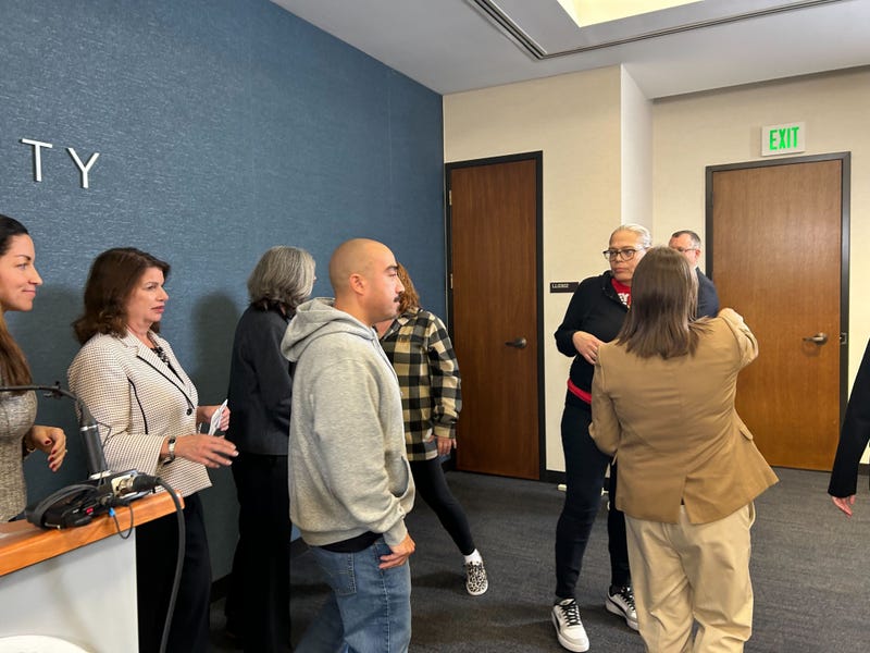 Edgar Barrientos-Quintana (center, hoodie) was previously charged with murder after a 2008 drive by shooting in Minneapolis that killed 18-year old Jesse Mickleson.