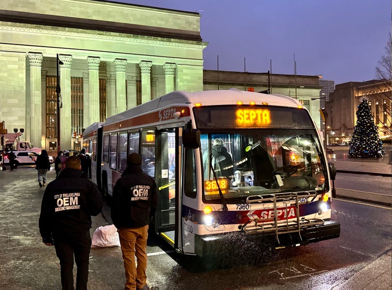 A SEPTA bus prepares to transport asylum seekers, who arrived from Texas on Dec.16, to the city's welcome center in North Philadelphia.