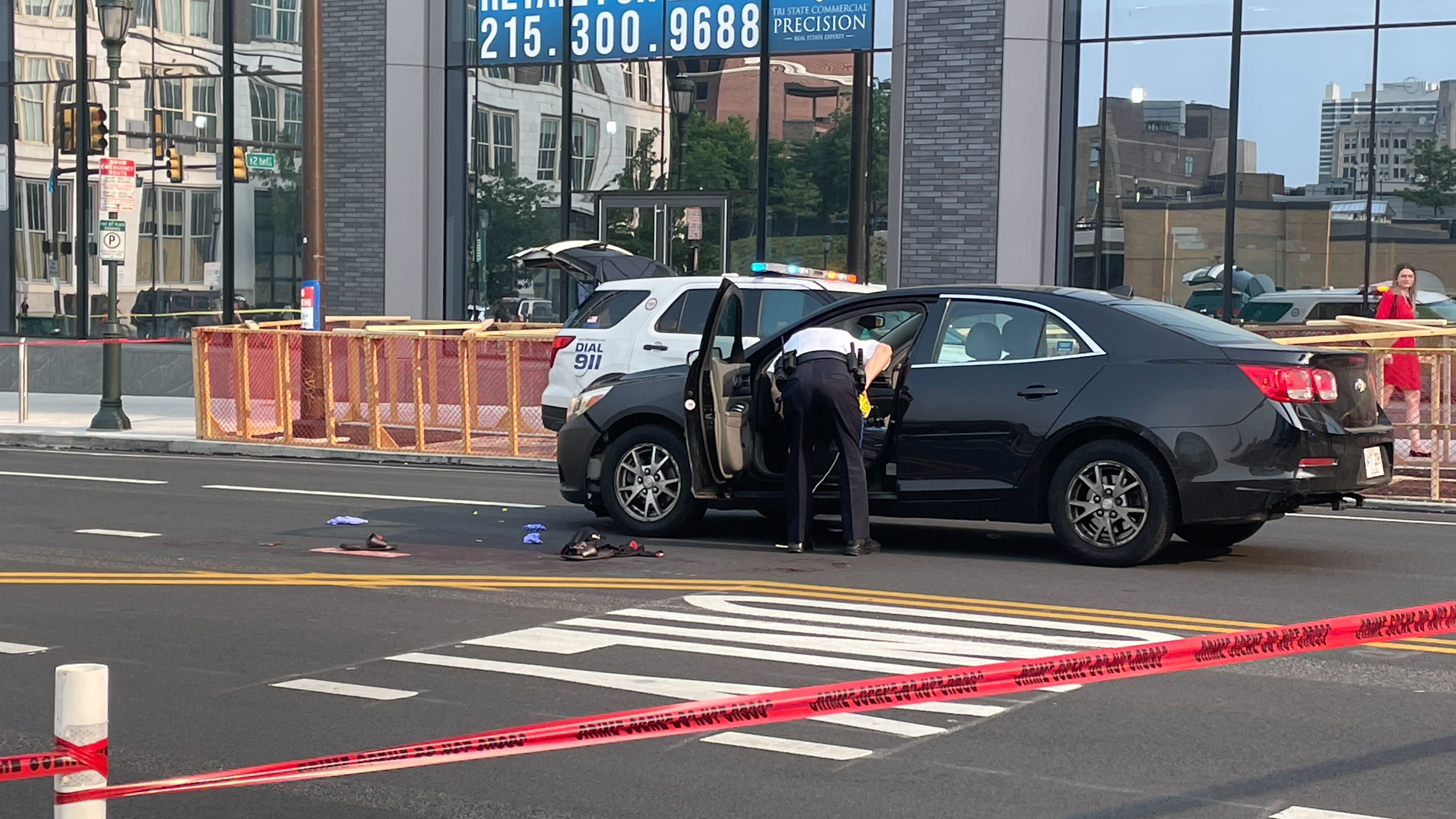 Apparent road rage gives her a broken window, him a gunshot wound