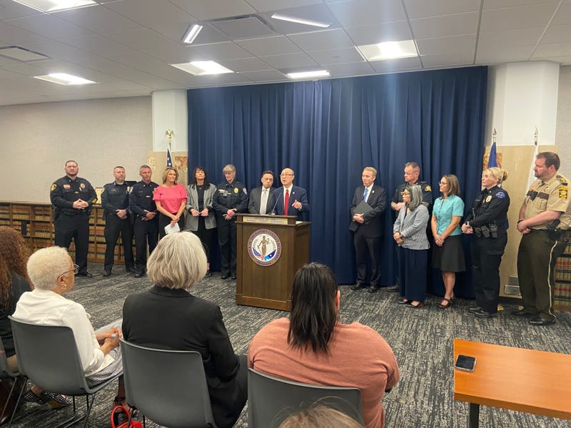 Ramsey County Attorney John Choi (center) explaining that law enforcement leaders are doubling down on their commitment to combat sexual assault.