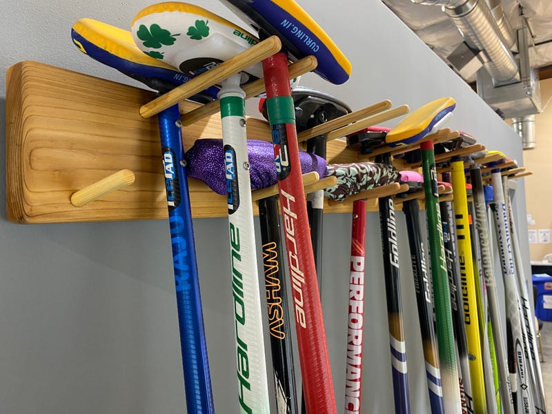 Curling brooms waiting for the next match.