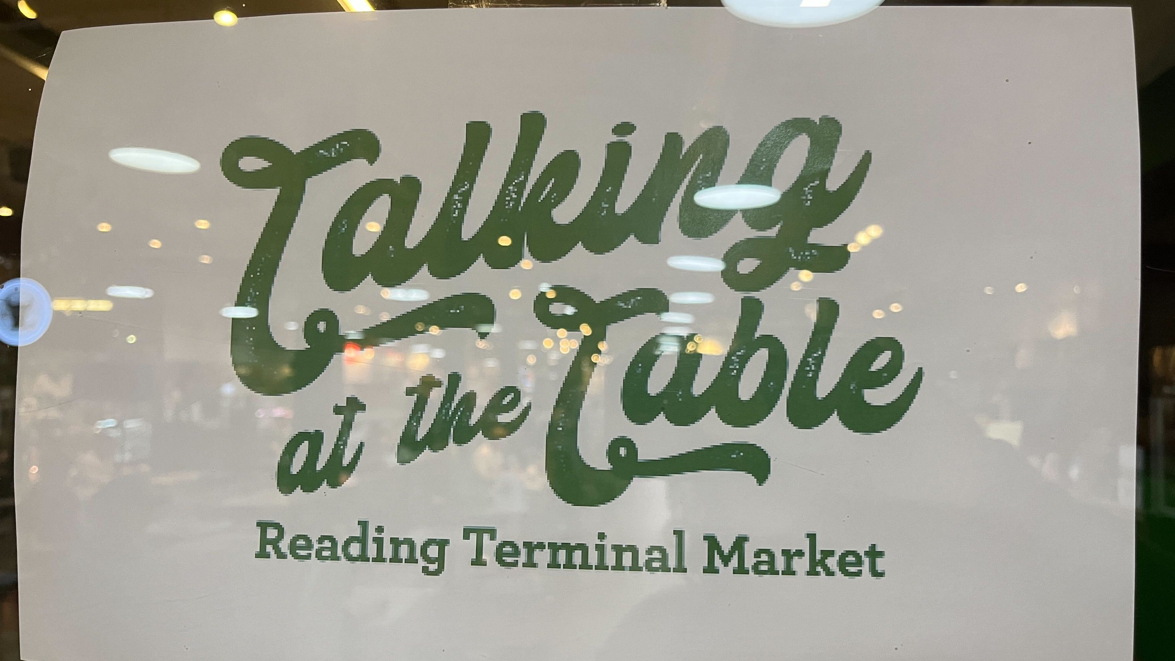 Strangers share tables at Reading Terminal Market for new project