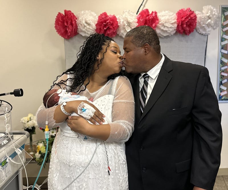 couple with baby