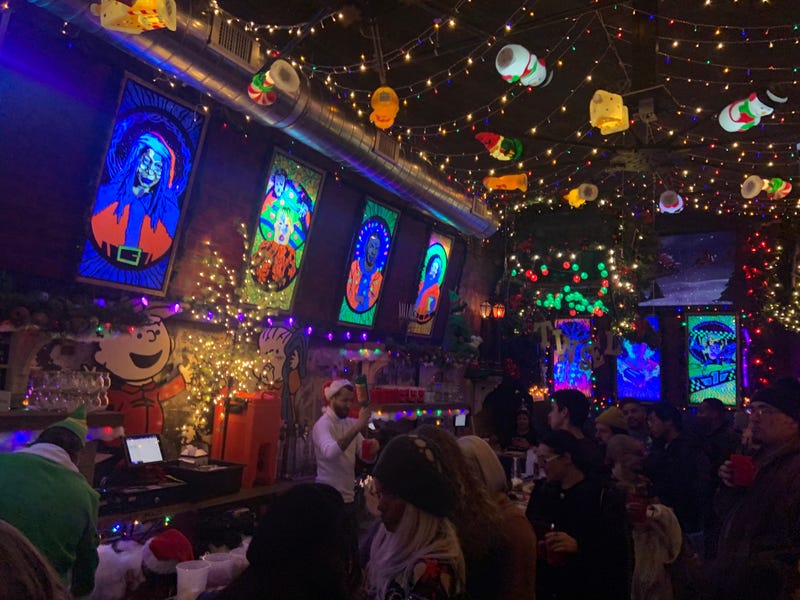 The cozy space at 12th and Sansom streets is decked out with images representing class Christmas comedies.