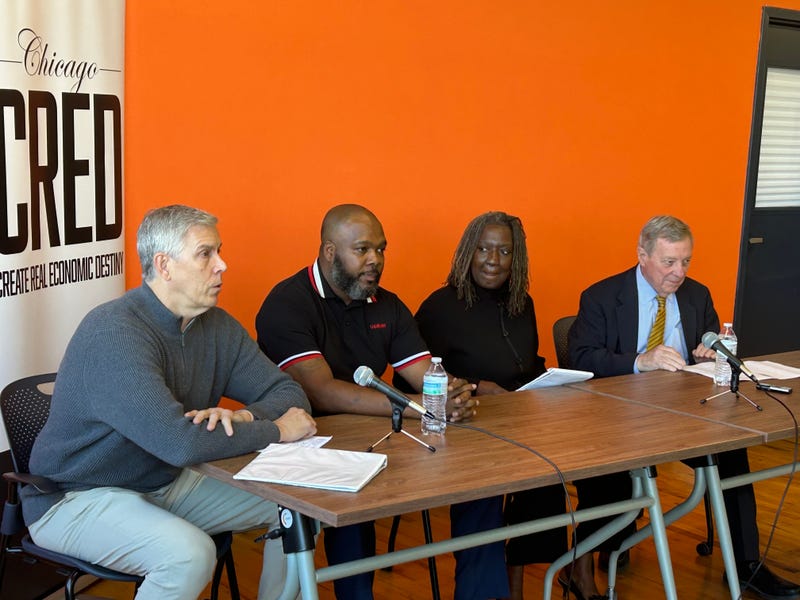 Arne Duncan, left, was among those who spoke to reporters on Tuesday about a new, nearly $4 million grant that's been awarded to the anti-violence organization Chicago CRED.