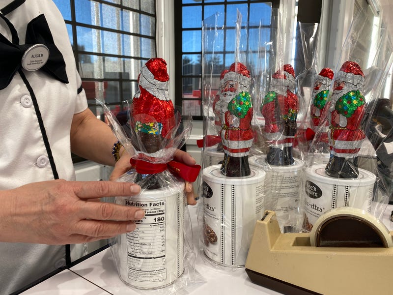 A See's Candies worker puts together holiday chocolates.