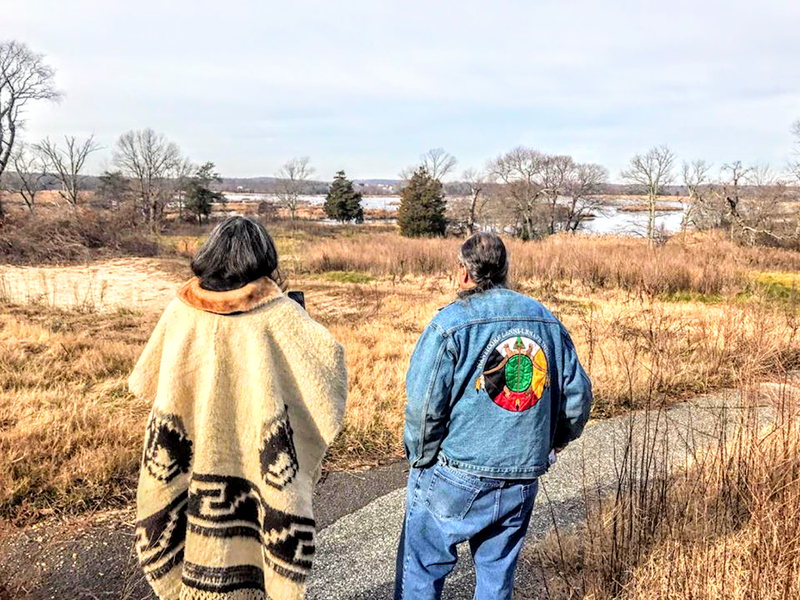 Tyrese Gould Jacinto and her dad Mark “Quiet Hawk” Gould look at the Cohanzick Nature Reserve.