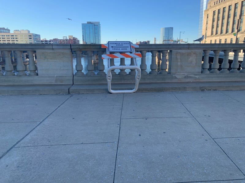 A sidewalk closure sign on the Market Street Bridge near 30th Street Station.