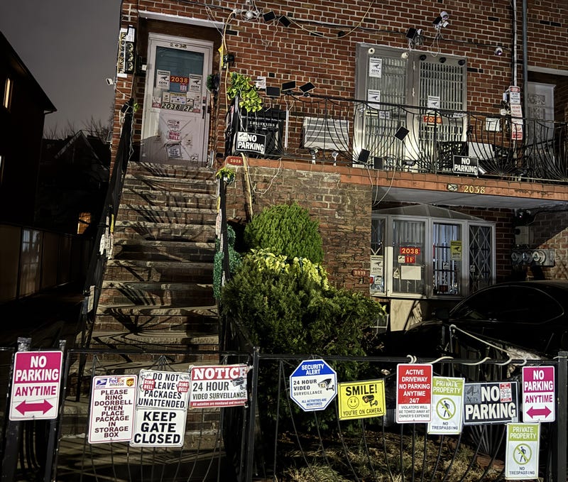 “They won’t listen, they won’t talk to you,” one neighbor said of the residents with the signs