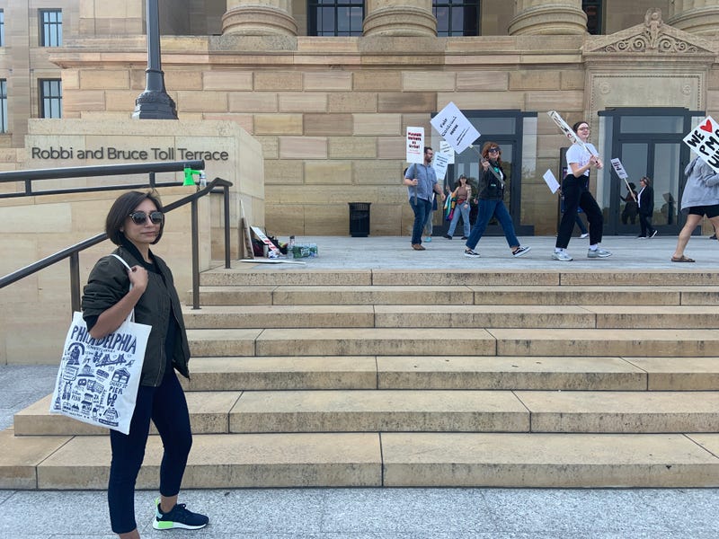 Ika Hamzah of Kuala Lumpur, Malaysia, opted not to go inside the museum, out of respect for the striking workers.