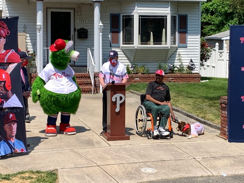 Veteran Arthur “Sonny” Wimberly being given the chance to throw out the first pitch at a Phillies-Red Sox game, joined by former Phillie Milt Thompson & the Phillie Phanatic.