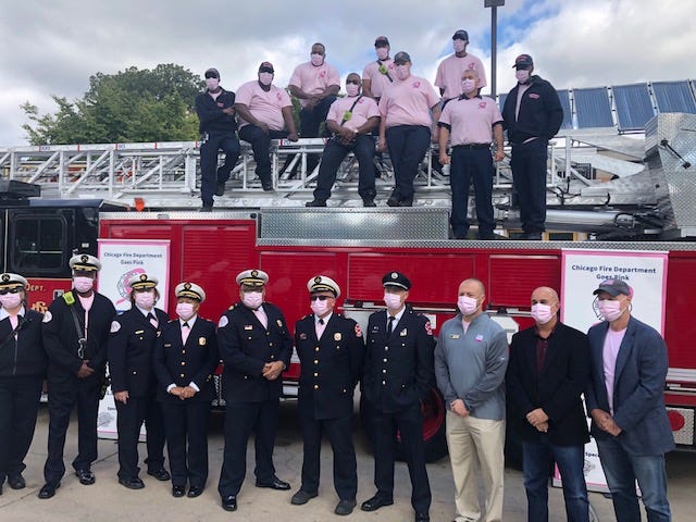 The Chicago Fire Department is observing Breast Cancer Awareness Month by outfitting firefighters and paramedics with pink shirts, masks and gloves.