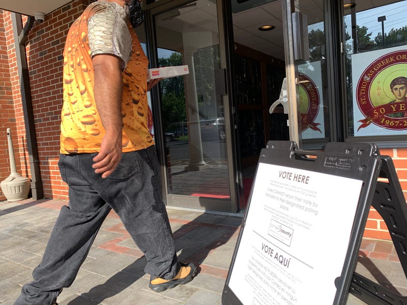 A voter enters a polling place in Cherry Hill, N.J., on June 8, 2021.