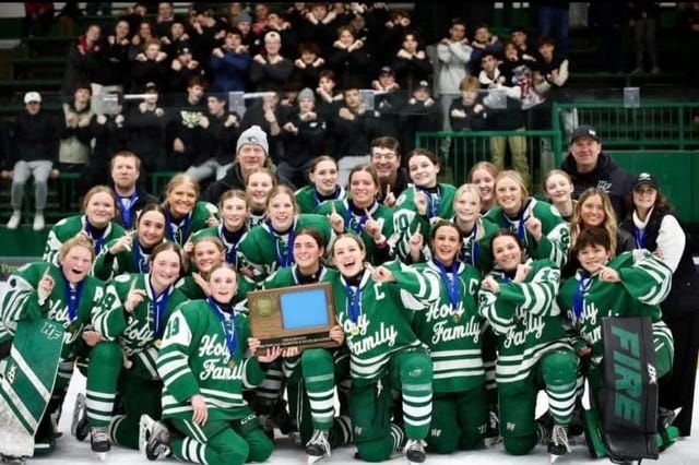 The girls' hockey team from Holy Family Catholic High School.