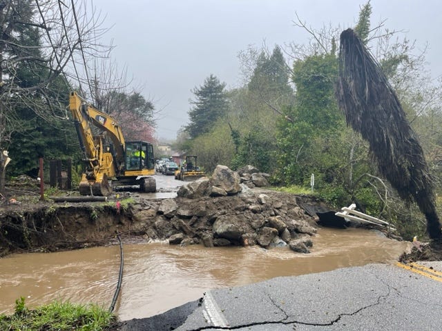 Road washed out in Soquel, Santa Cruz County, leaving residents stranded.