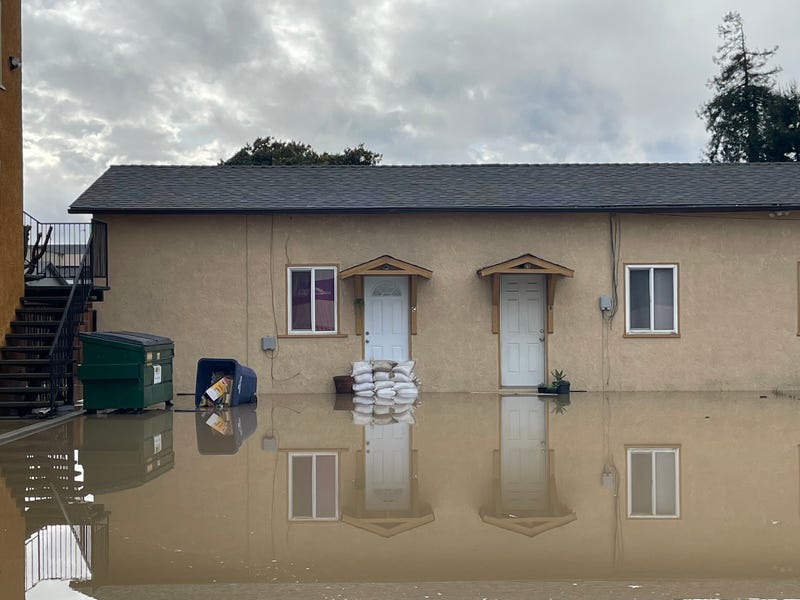 The levee breaking led to massive damage in the small town.