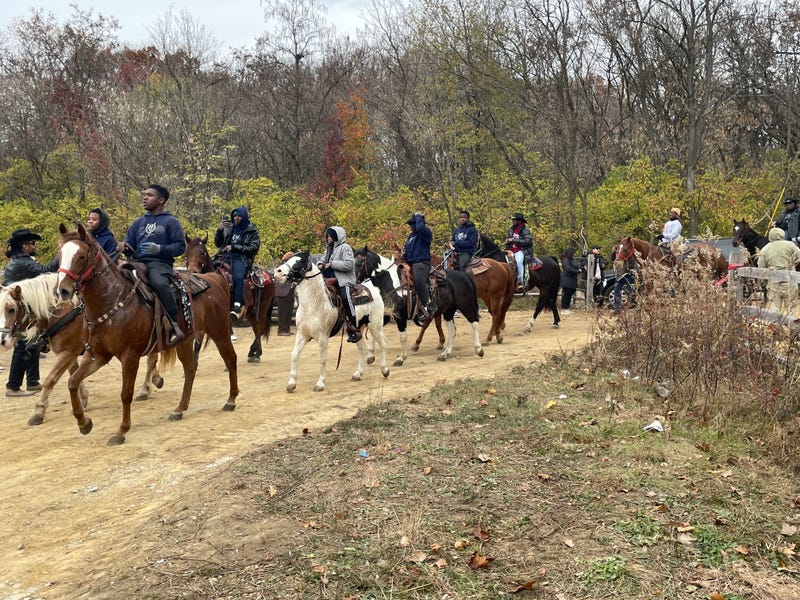 Members of the Fletcher Street Urban Riding Club on horseback