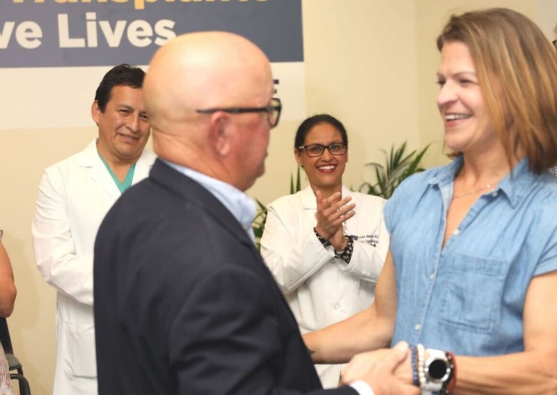 Jill Pinkelman meets the recipient of her donated kidney in Camden, N.J.