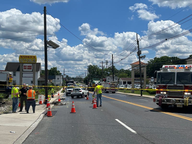 A utility worker is dead and several other people are injured after a car crashed into a worksite on the White Horse Pike in Magnolia, Camden County.