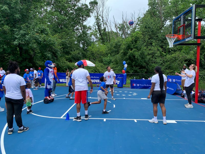 Allen Iverson plays with kids at new community basketball court in West Philly