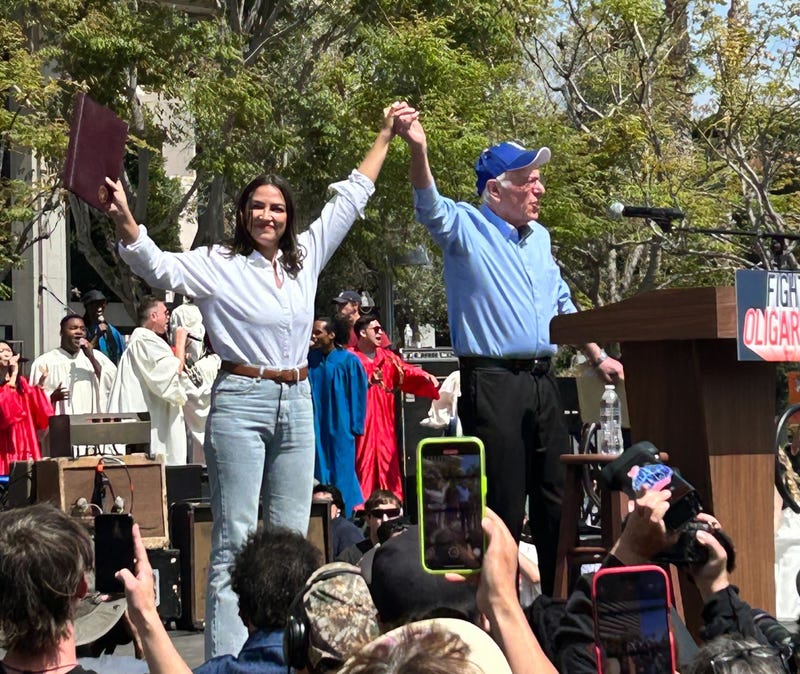Sen. Bernie Sanders (I-Vt.) and Rep. Alexandria Ocasio-Cortez (D-N.Y.) at the "Fighting Oligarchy" rally on April 12, 2025 in Los Angeles, Calif. 