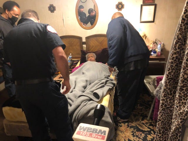 COVID-19 VaccineTwo firefighter-paramedics on a COVID-19 vaccination detail paid a visit to the home of Mrs. Elizabeth Holmes, 99, near the United Center, with the one-dose Johnson & Johnson vaccine.