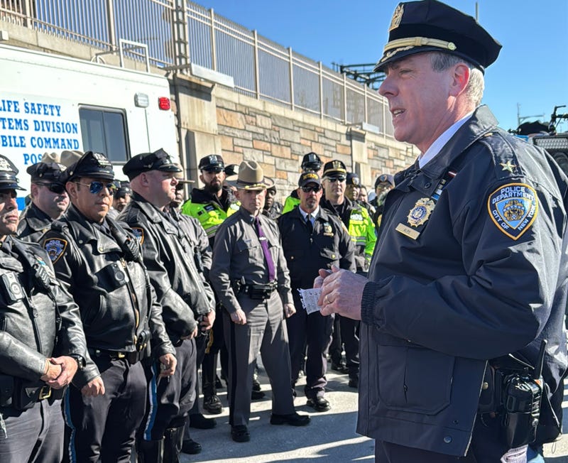 Deputy Chief Thomas Alps, of the NYPD's Transportation Bureau, addresses officers from multiple city and state agencies who've been cracking down on "ghost" cars
