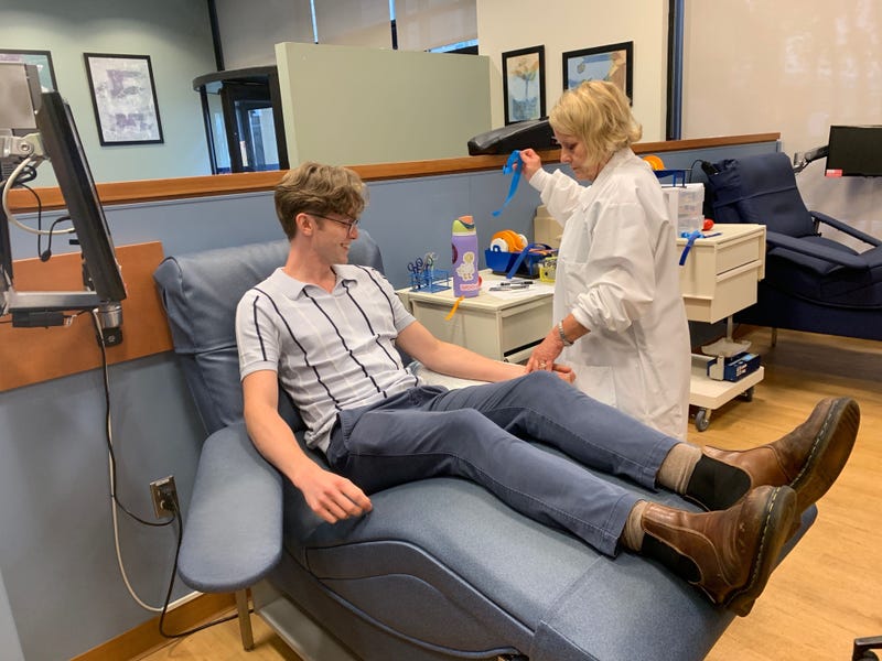John Kee prepares to give blood