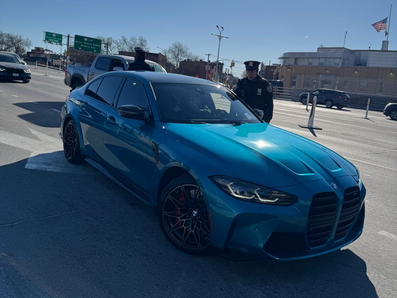 A vehicle was pulled over at the tunnel for having no front license plate